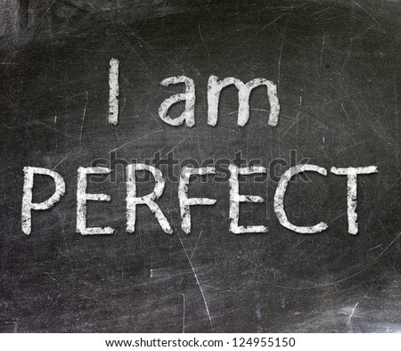 I am Perfect handwritten with white chalk on a blackboard - stock photo