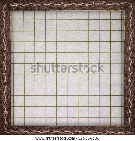 Paper in a leather box frame as background or texture