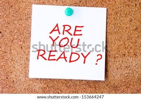 Are You Ready, written on an white sticky note on a cork bulletin board