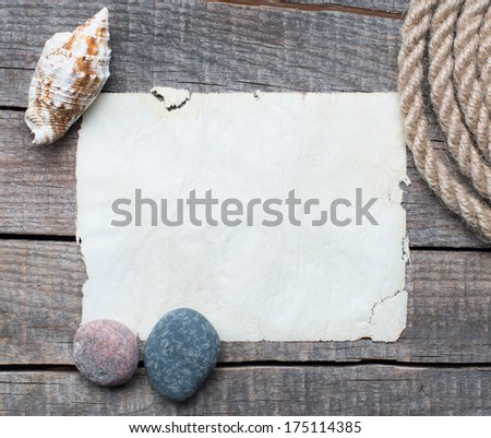 Blank open notebook on sea rope on wooden table