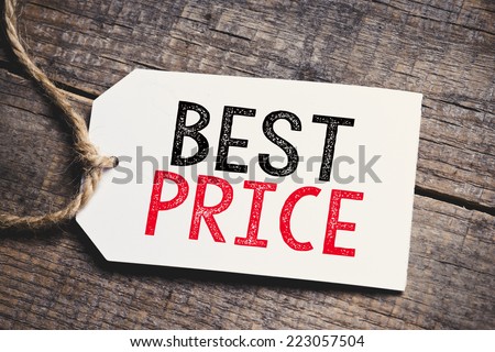 Best Price on blank tags. Red inscription Best Price on blank tags on wooden table