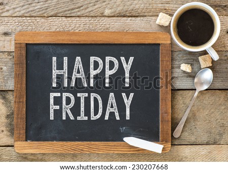 Happy Friday sign on Blackboard. Blackboard with Happy Friday sign and cup of coffee on wooden background