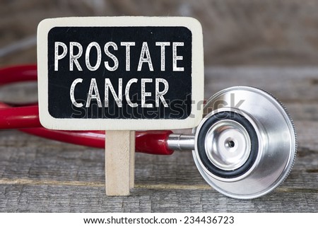Prostate cancer and stethoscope. Medecine concept. Blackboard with word prostate cancer and stethoscope