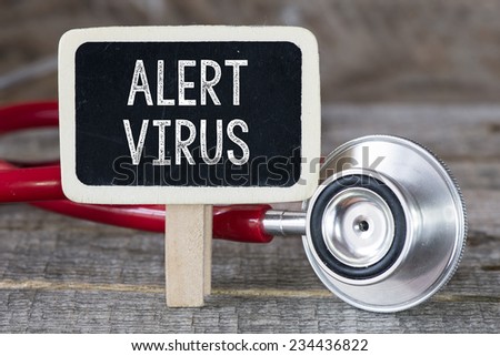 Virus alert and stethoscope. Medecine concept. Blackboard with word virus alert and stethoscope