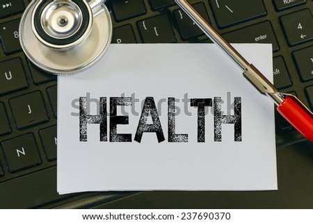 Health sign and stethoscope. Health sign and stethoscope. Medicine concept on computer keyboards