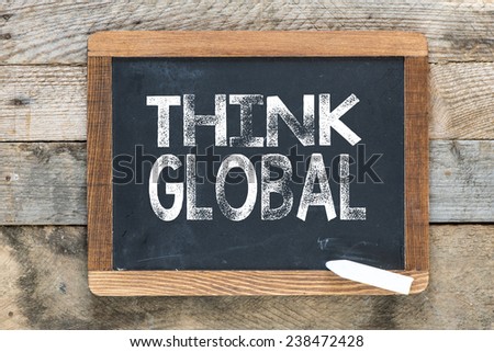 Think global sign. Think global sign n chalkboard