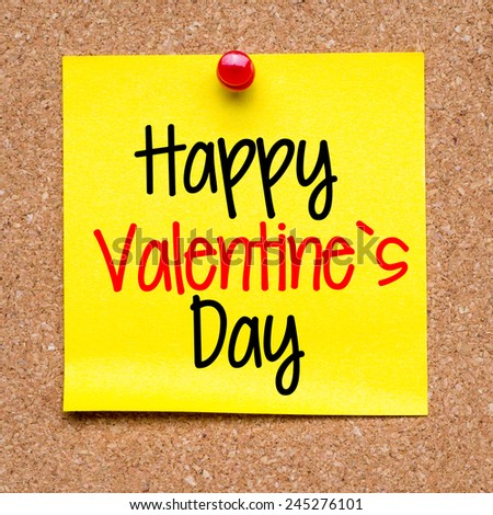 Happy Valentine\'s day note. Blank yellow sticky note with Happy Valentine\'s day pined on a cork bulletin board.