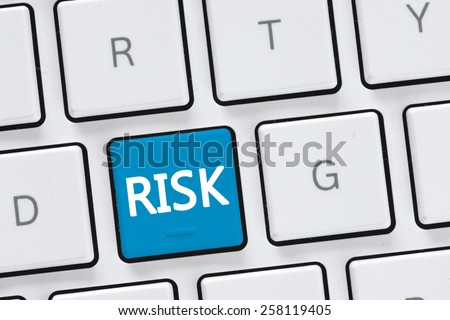 Computer keyboard with risk. Computer keyboard with risk concept