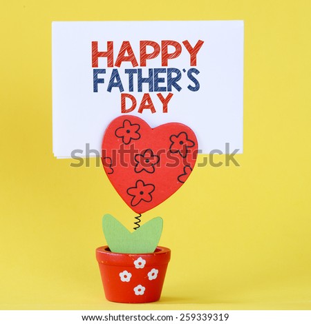 Happy fathers day with heart. Happy fathers day message with decorative heart.