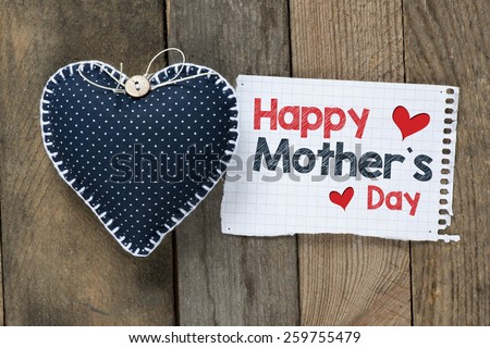 Happy Mother\'s day message with hearts. Happy Mother\'s day message on wooden background with hearts