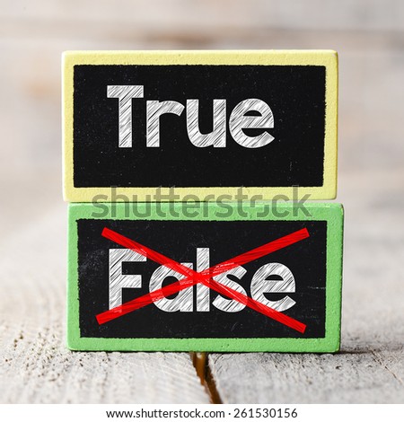 True or False Blackboards. True or False Blackboards on wood background