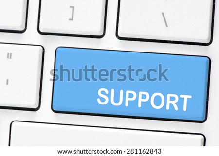 Computer white keyboard with support . Computer white keyboard with blue button  support