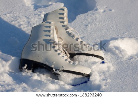 Figure skates on the snow   Save to a Lightbox?     Find Similar Images    Share? Figure skates in snow close-up