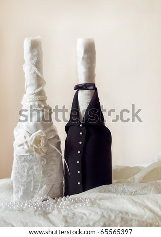 stock photo Champagne wedding bottles in suit