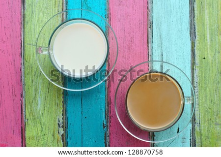 coffee and milk on colorful background.