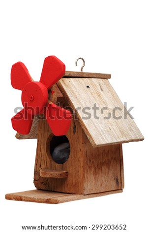 colorful wooden bird house isolated on white background.
