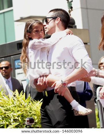 LOS ANGELES - JUN 19:  Casper Smart and Emme arrives to the Walk of Fame Honors Jennifer Lopez  on June 19,2013 in Hollywoods, CA