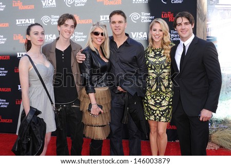 LOS ANGELES - JUN 22:  Steven R. McQueen, Luc Robitalle and Family arrives to the \'The Lone Ranger\' Hollywood Premiere  on June 22, 2013 in Hollywood, CA
