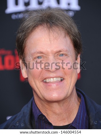 LOS ANGELES - JUN 22:  Rick Dees arrives to the \'The Lone Ranger\' Hollywood Premiere  on June 22, 2013 in Hollywood, CA