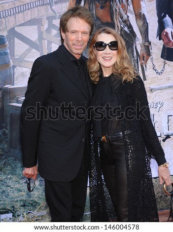 LOS ANGELES - JUN 22:  Jerry Bruckheimer & wife Linda arrives to the \'The Lone Ranger\' Hollywood Premiere  on June 22, 2013 in Hollywood, CA