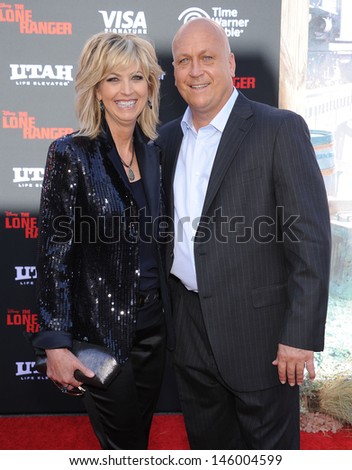 LOS ANGELES - JUN 22:  Cal Ripkin Jr. & wife Kelly arrives to the \'The Lone Ranger\' Hollywood Premiere  on June 22, 2013 in Hollywood, CA