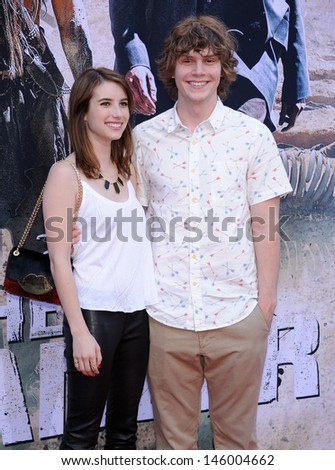 LOS ANGELES - JUN 22:  Emma Roberts & Evan Peters arrives to the 'The Lone Ranger' Hollywood Premiere  on June 22, 2013 in Hollywood, CA