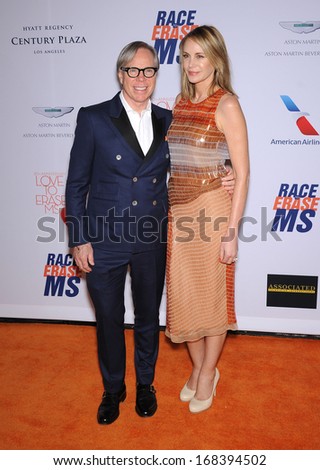 LOS ANGELES - MAY 03:  Tommy Hilfiger & Dee Ocleppo arrives to the Race To Erase MS 2013  on May 03, 2013 in Century City, CA