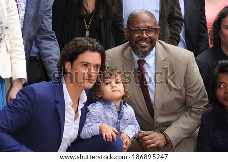 LOS ANGELES - APR 02:  Orlando Bloom, Flynn Bloom & Forest Whitaker arrives to the Walk of Fame honors Orlando Bloom  on April 02, 2014 in Hollywood, CA