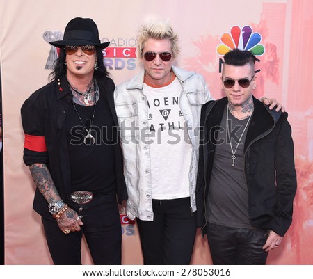 LOS ANGELES - MAR 29:  SIXX: A.M. arrives to the 2015 iHeartRadio Music Awards  on March 29, 2015 in Hollywood, CA