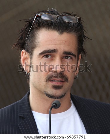 LOS ANGELES - JAN 26:  Colin Farrell as Donald Sutherland is honored with a star on Walk of Fame  on January 26, 2011 in Hollywood, CA
