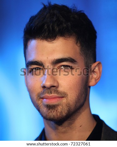 LOS ANGELES - DEC 11:  Joe Jonas arrives to the \'Tron: Legacy\' World Premiere  on December 11, 2010 in Hollywood, CA