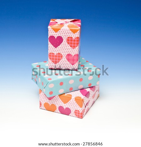 Presents or gift\'s on a graduated blue studio background.
