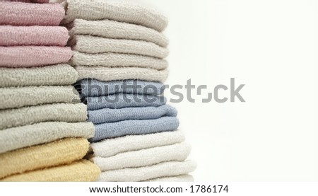 Face cloths folded and stacked.