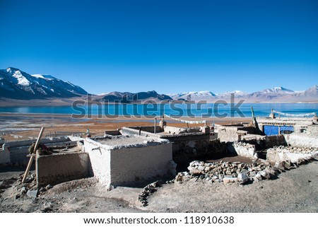 A poor village near lake in Tibet