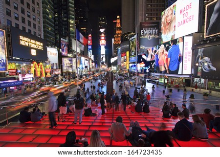 New York City,United States,June 05 2012: People spending time during the night in the busy center on Times Square