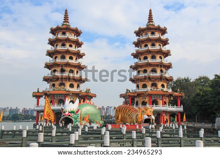 Kaohsiung, Taiwan - November 17,2014: Tourists at dragon And Tiger Pagodas at Lotus Pond, Kaohsiung, Taiwan