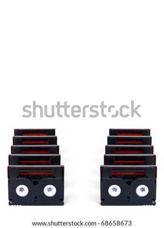 Mini DV magnetic tapes in a row, isolated on white background