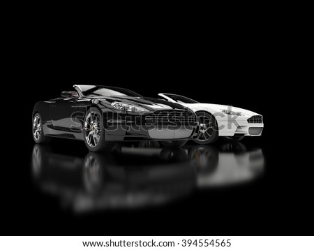 Black and white luxury sports cars - blurry reflection