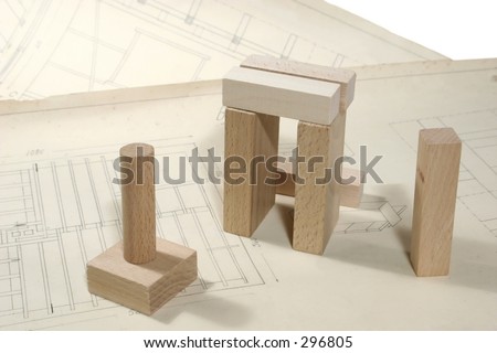Blocks of wood on construction papers