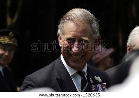 Prince Charles smiling after leading a WWI commemoration service in northern France for the Battle of the Somme. July 1, 2006.