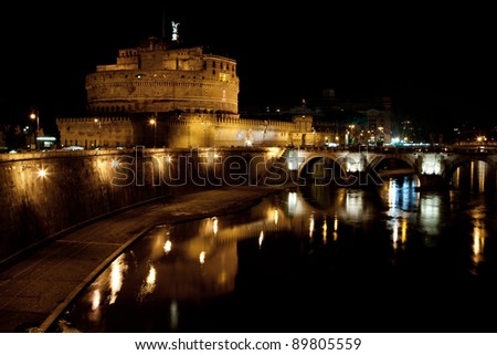 Night view of St. Angel Castle and Tiber river. An Amazing monument in the heart of Rome