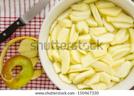 A finished plate and spoon, after eating apple pie a la mode. Part of a series of images showing the preparation of traditional apple pie. Also see my series on the preparation of vanilla ice cream.