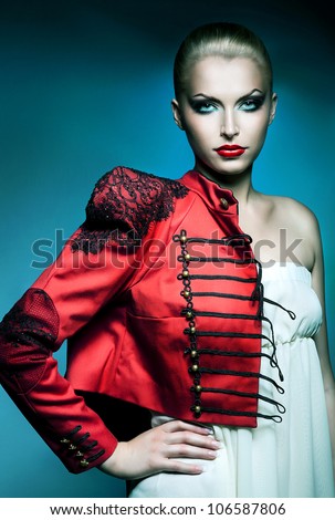 adult beautiful blonde woman in red jacket with red lips