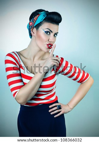 funny pin-up woman says quiet