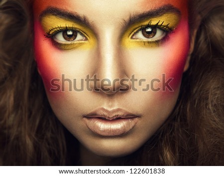 beautiful woman with eye shadows on face