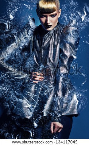 woman in silver jacket with silver abstract