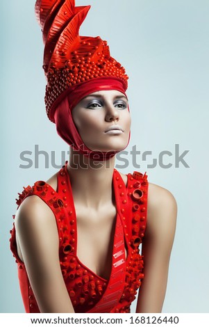 woman in red creative swirl hat