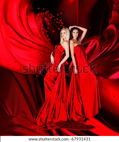  Long Dress on Two Women In Red Dress With Long Hair And Hearts On Red Drapery Stock