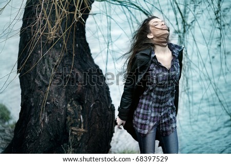 stock photo : Portrait of emotional romantic woman standing on the wind