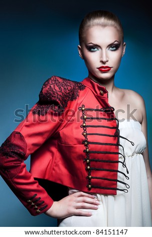 adult beautiful blonde woman in red jacket with red lips